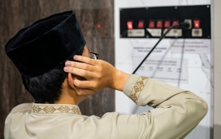 Muslim man calling to prayer