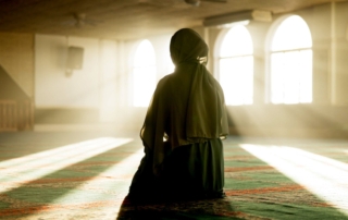 Muslim woman sitting in the mosque